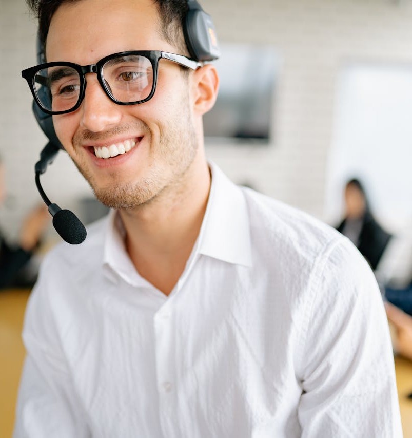 photoclose-up-shot-of-a-man-wearing-eyeglasses-and-headphones